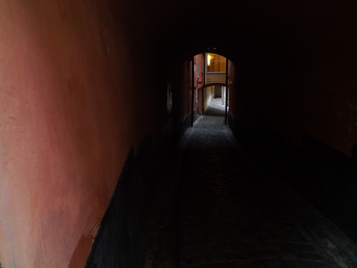 P1350834 a person in a dark room