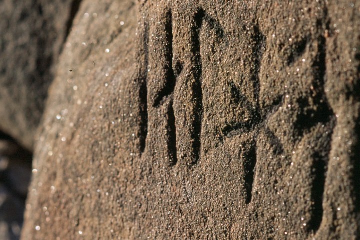 a close up of a stone building