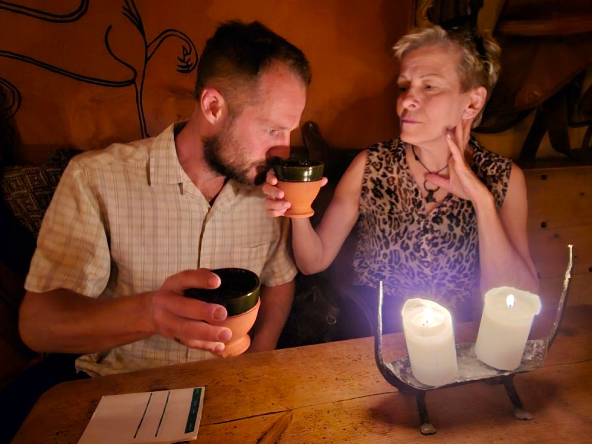 a man and a woman sitting at a table