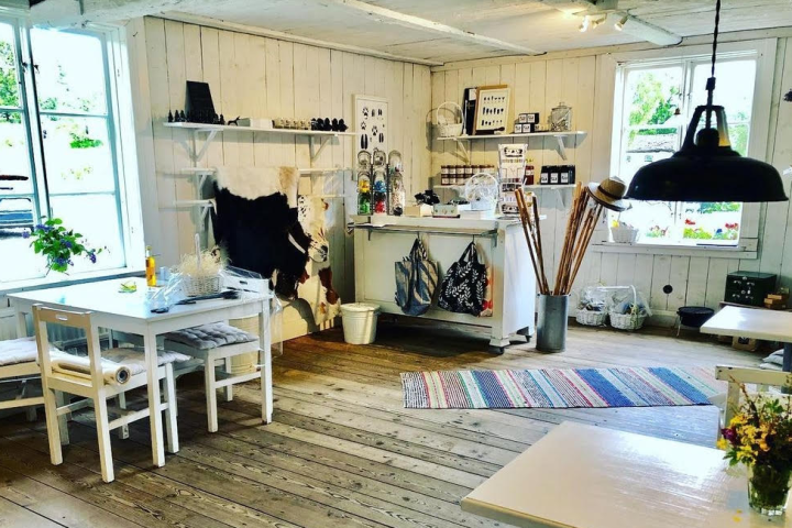 a bedroom with a desk and chair in a room