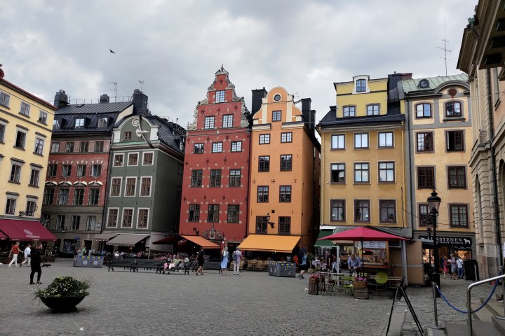 a group of people in front of Gamla stan