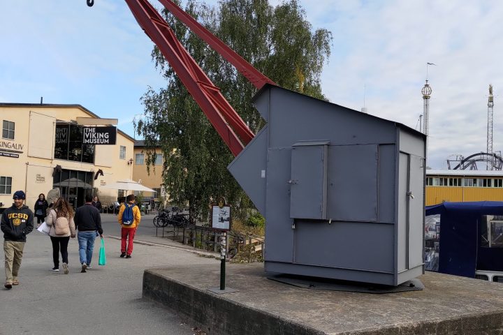 a group of people standing in front of a building
