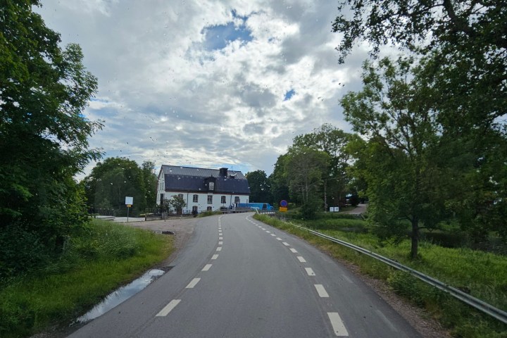 a sign on the side of a road