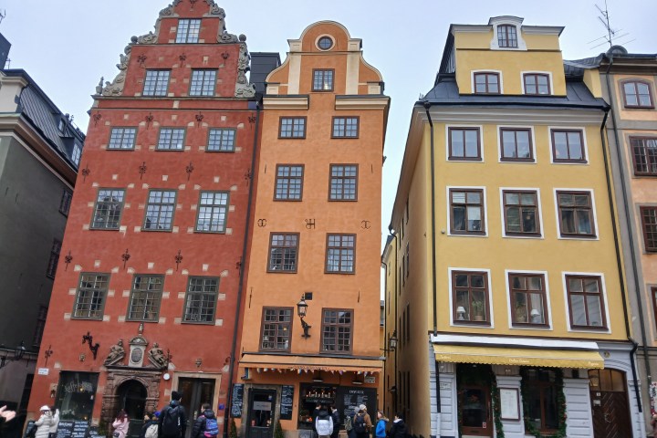 a group of people in front of Gamla stan